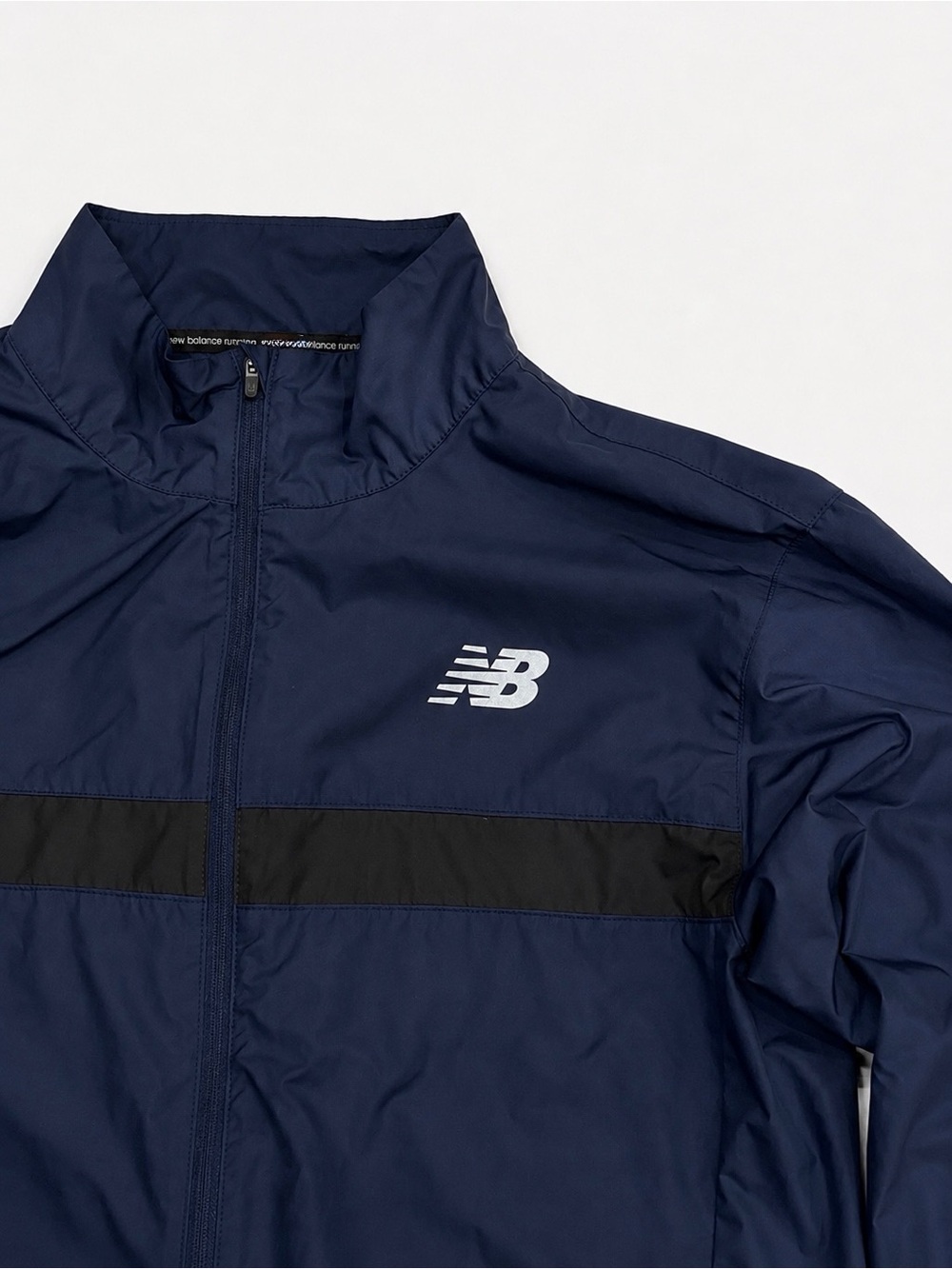 New Balance Navy Windbreaker with Black Chest Stripe